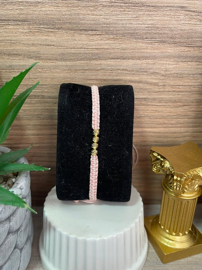 PULSERA TEJIDA ROSADA 4 BALINES ORO LAMINADO