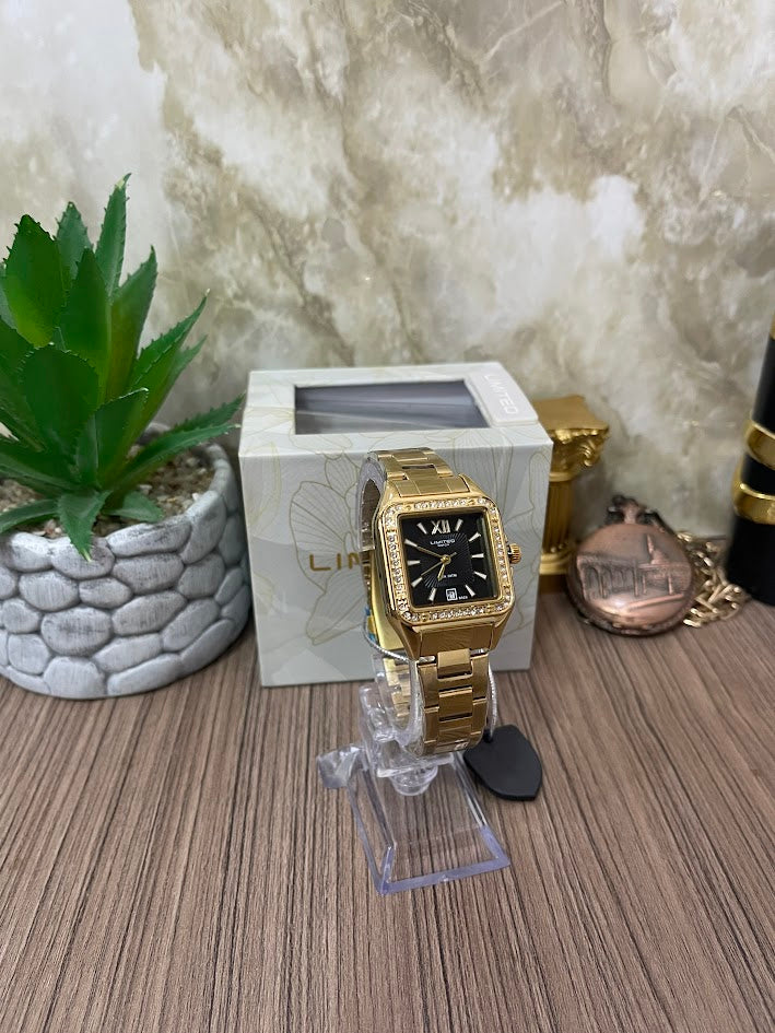 RELOJ LIMITED DAMA DORADO DETALLES EN PIEDRAS NUMEROS ROMANOS
