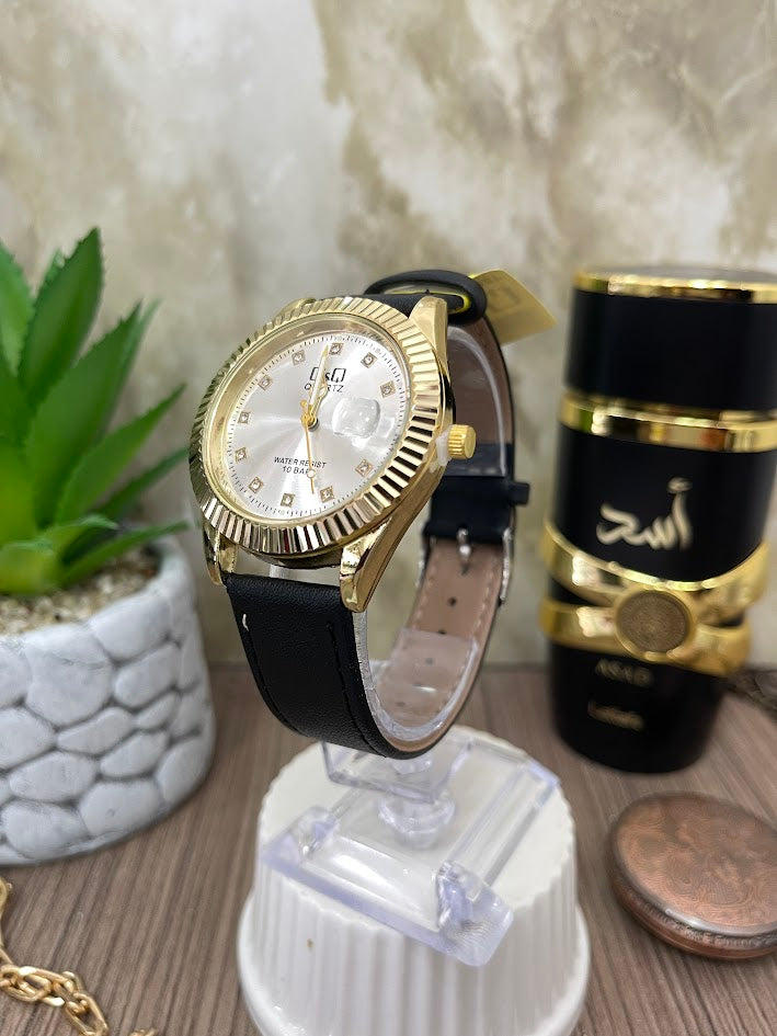 Q&Q DORADO MANILLA NEGRA EN CUERO