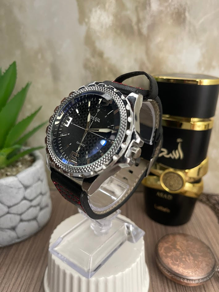 FOSSIL PLATEADO ESFERA AZUL MANILLA NEGRA