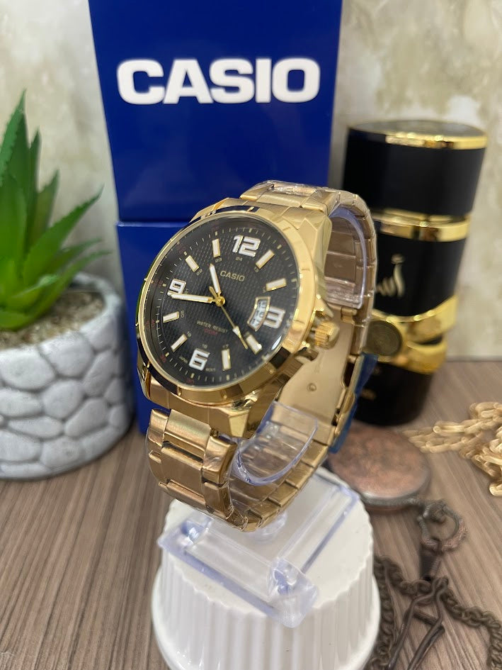 CASIO CABALLERO DORADO ESFERA NEGRA CALENDARIO