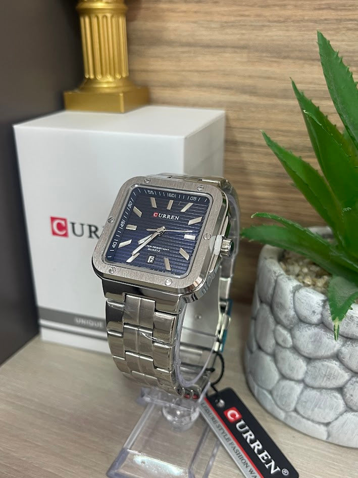 RELOJ CURREN PLATEADO CUADRADO FONDO AZUL CON CALENDARIO