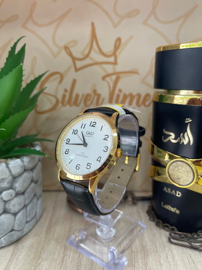 RELOJ QYQ CABALLERO DORADO MANILLA DE CUERO NUMEROS COMPLETOS