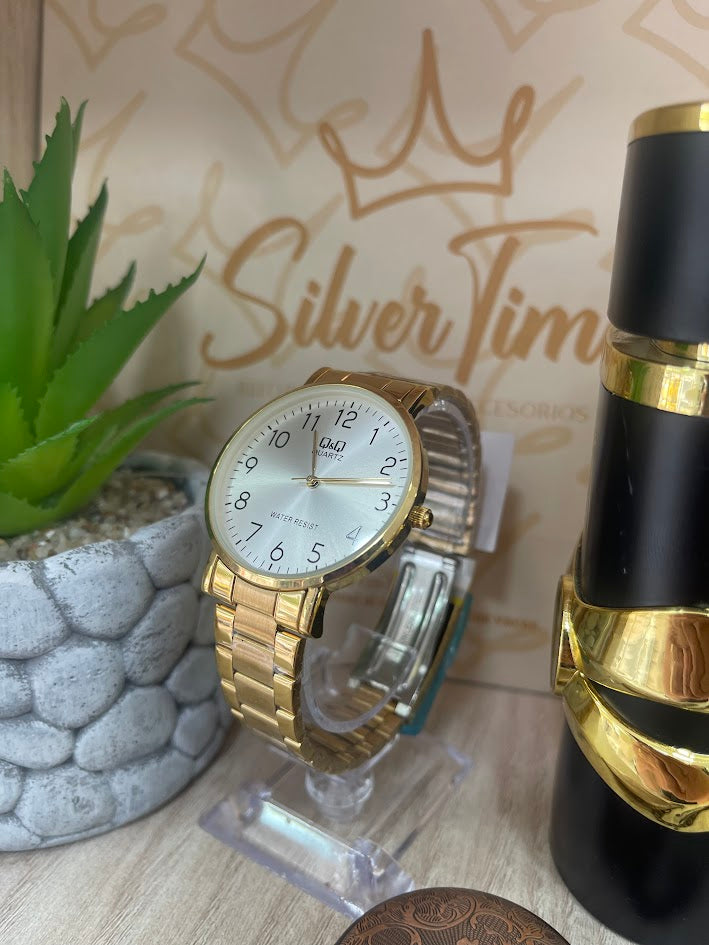 RELOJ HOMBRE QYQ DORADO ESFERA PLATEADA NUMEROS COMPLETOS