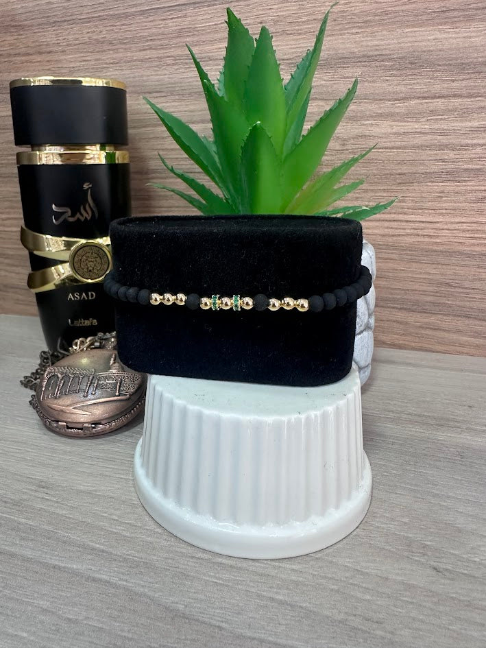 PULSERA NEOPRENO NEGRA ORO LAMINADO
