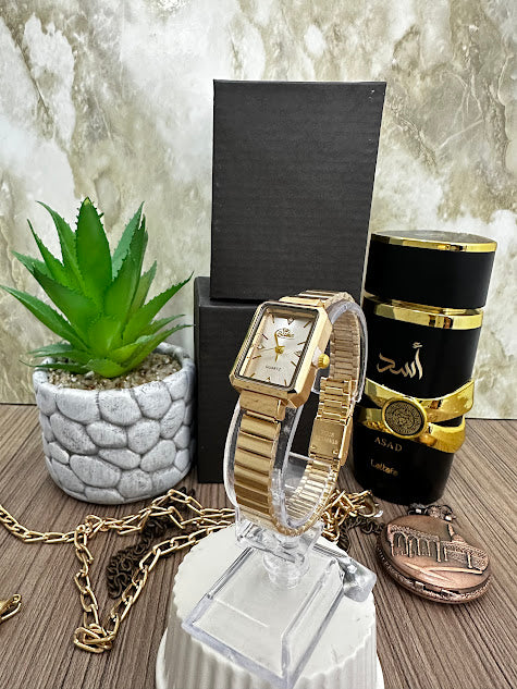 RELOJ BLU DAMA CUADRADO MANILLA DORADA ESFERA PLATEADA