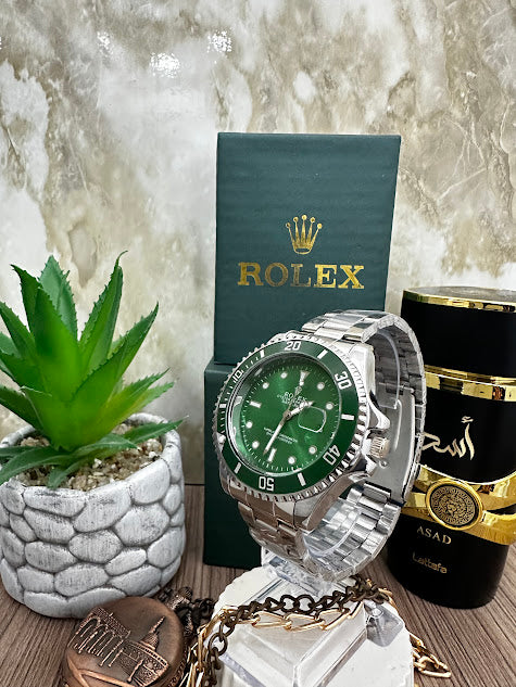 RELOJ ROLEX MANILLA PLATEADA ESFERA VERDE ARO VERDE INCLUYE CAJA