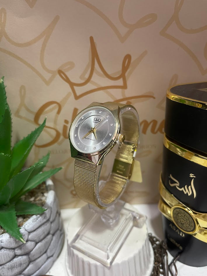 RELOJ QYQ DORADO ESFERA PLATEADA