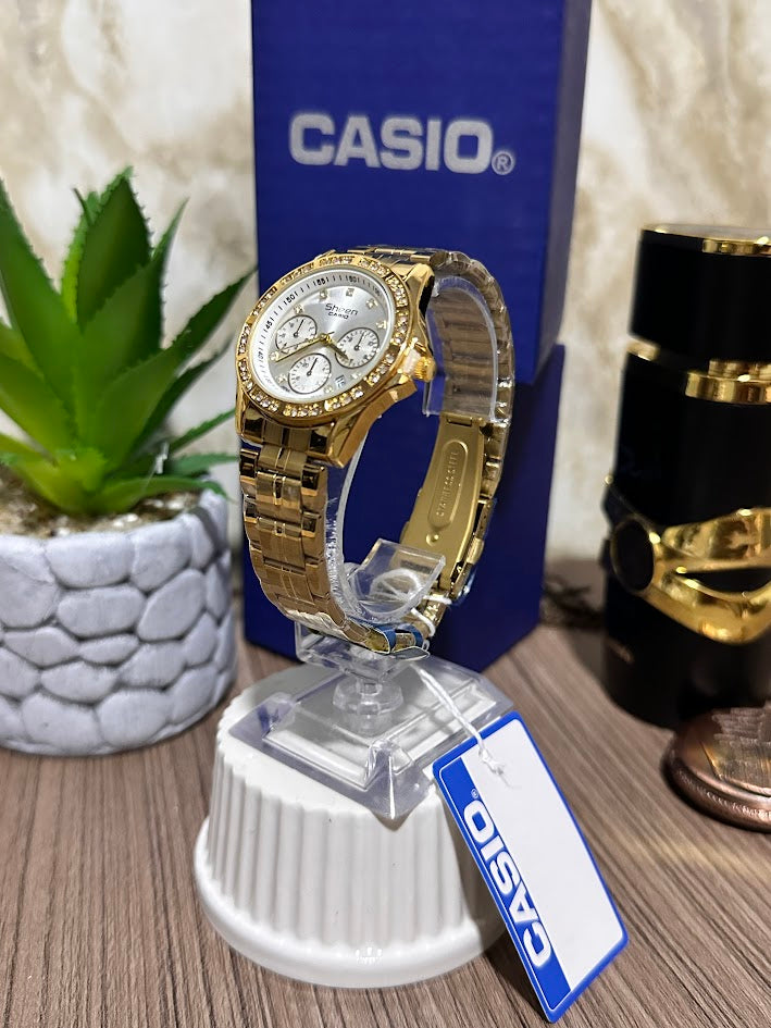 CASIO METALICO DORADO ESFERA PLATEADA BORDE DIAMANTE