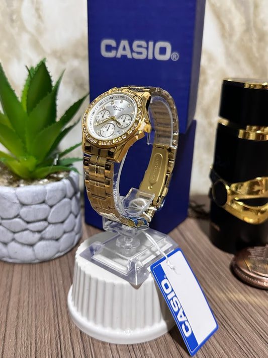 CASIO METALICO DORADO ESFERA PLATEADA BORDE DIAMANTE