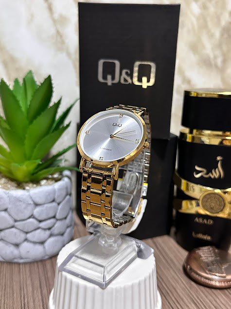 Q&Q DORADO ESFERA BLANCA CON DIAMANTE