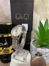 RELOJ Q&Q DAMA BICOLOR ESFERA BLANCA ARO ESTRIADO
