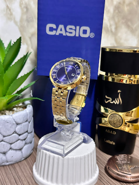 CASIO DAMA DORADO ESFERA AZUL CON CALENDARIO