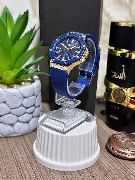 RELOJ GUESS DORADO ESFERA AZUL MANILLA DE SILICONA AZUL - VARIADOS