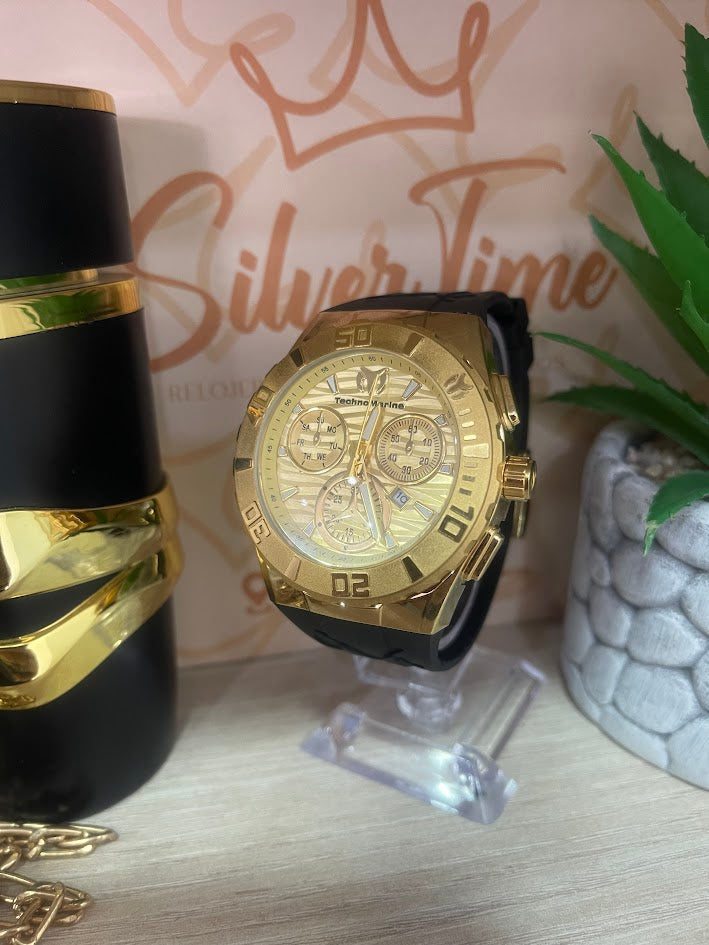 TECHNOMARIN DORADO MANILLA NEGRA DETALLES BLANCOS
