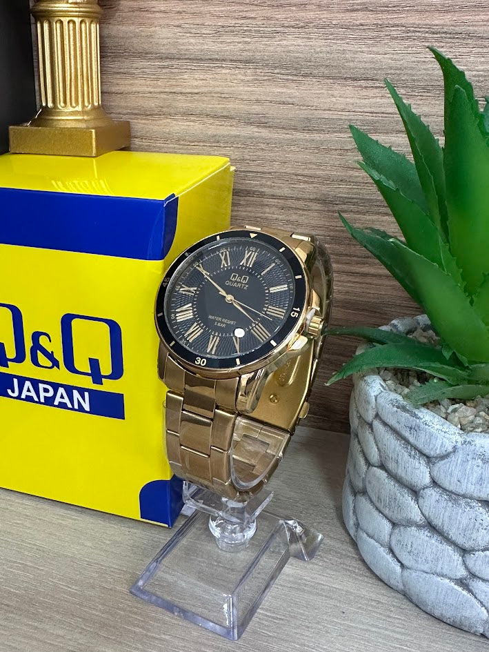 RELOJ QYQ DORADO FONDO NEGRO ARO NEGRO