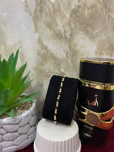 PULSERA EN ORO LAMINADO NEGRA BALINES DE 2 EN 2