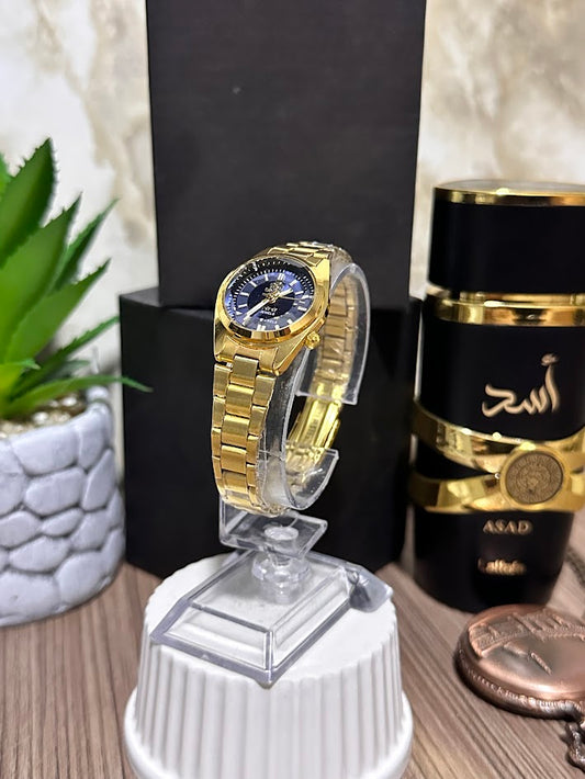 RELOJ ORIENT MINI DAMA DORADO FONDO AZUL OSCURO