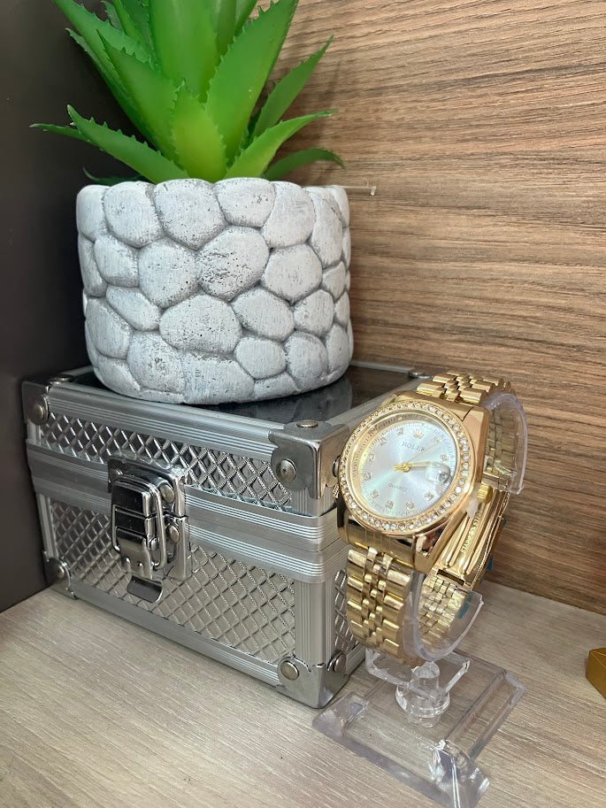 RELOJ DAMA ROLEX DORADO DETALLES EN PIEDRA FONDO PLATEADO