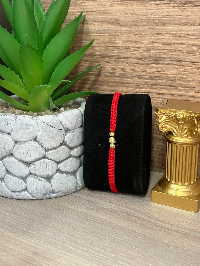 PULSERA TEJIDA ROJA BALIN X3 ORO LAMINADO