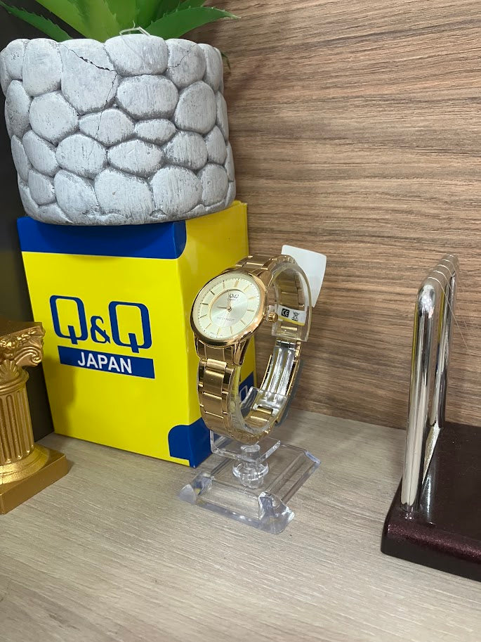 RELOJ QYQ DAMA DORADO REDONDO DELGADO