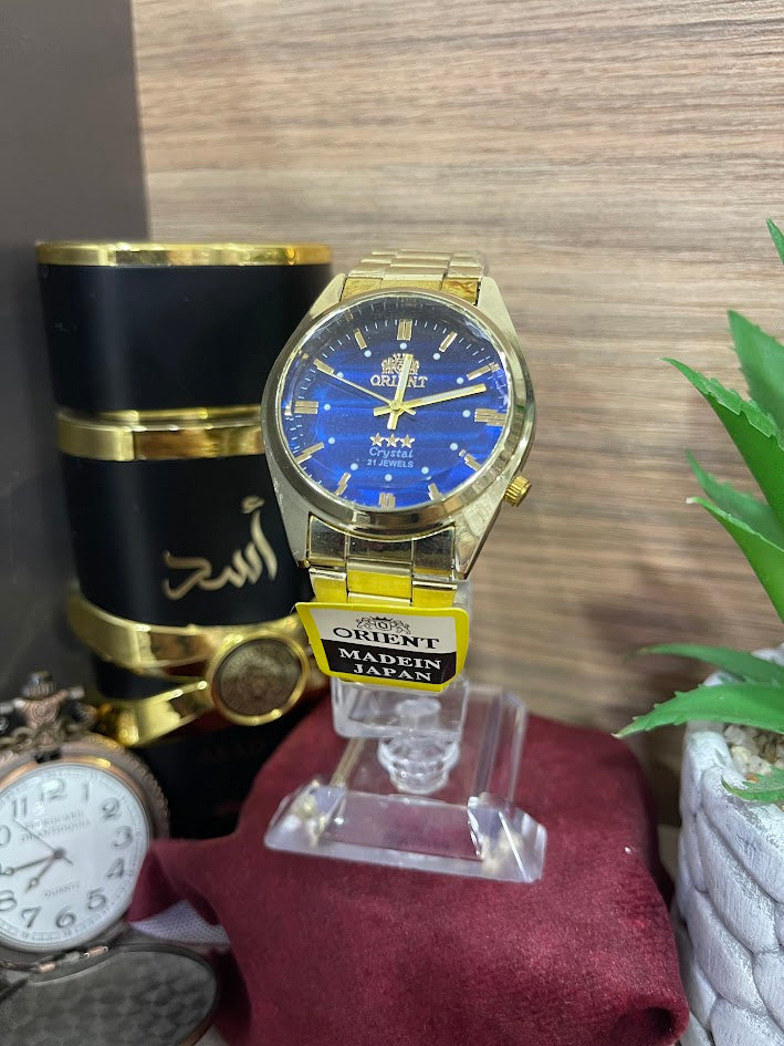 RELOJ ORIENT DORADO ESFERA AZUL