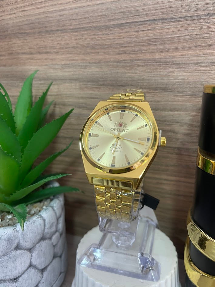 RELOJ ORIENT DORADO