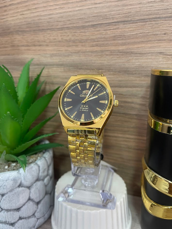 RELOJ ORIENT DORADO Y NEGRO