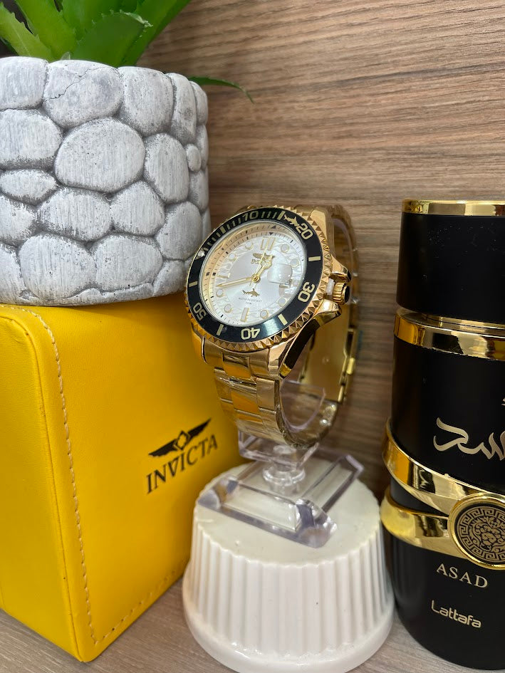 RELOJ INVICTA DORADO ARO NEGRO INCLUYE CAJA DE LUJO