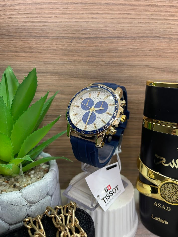 RELOJ TISSOT AZUL CAJA DORADA