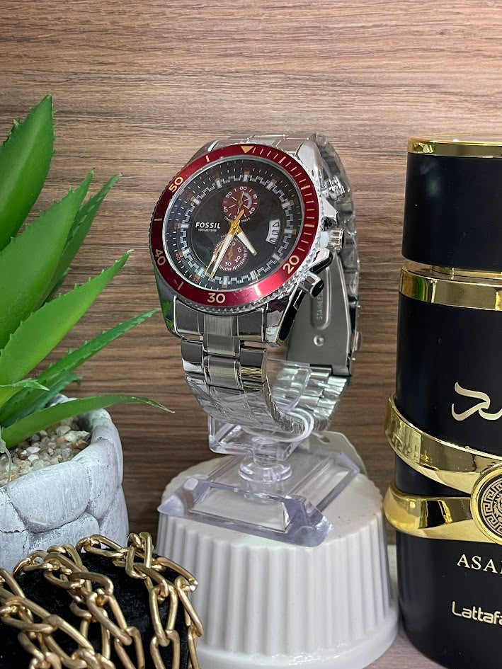 RELOJ FOSIL CABALLERO PLATEADO ARO ROJO