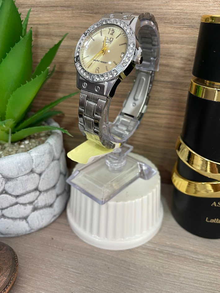 RELOJ QYQ DAMA PLATEADO