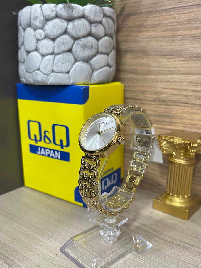 RELOJ QYQ DAMA DORADO ESFERA PLATEADA