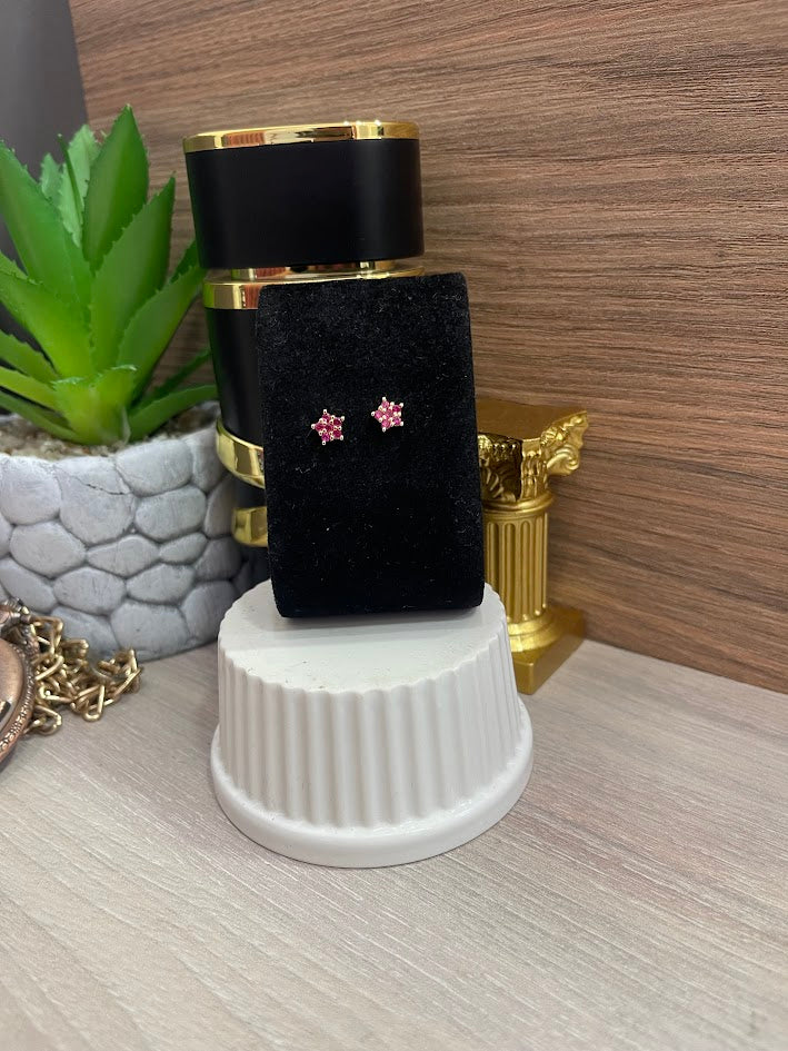 TOPO ESTRELLA MICROCIRCON 7MM FUCSIA ORO LAMINADO