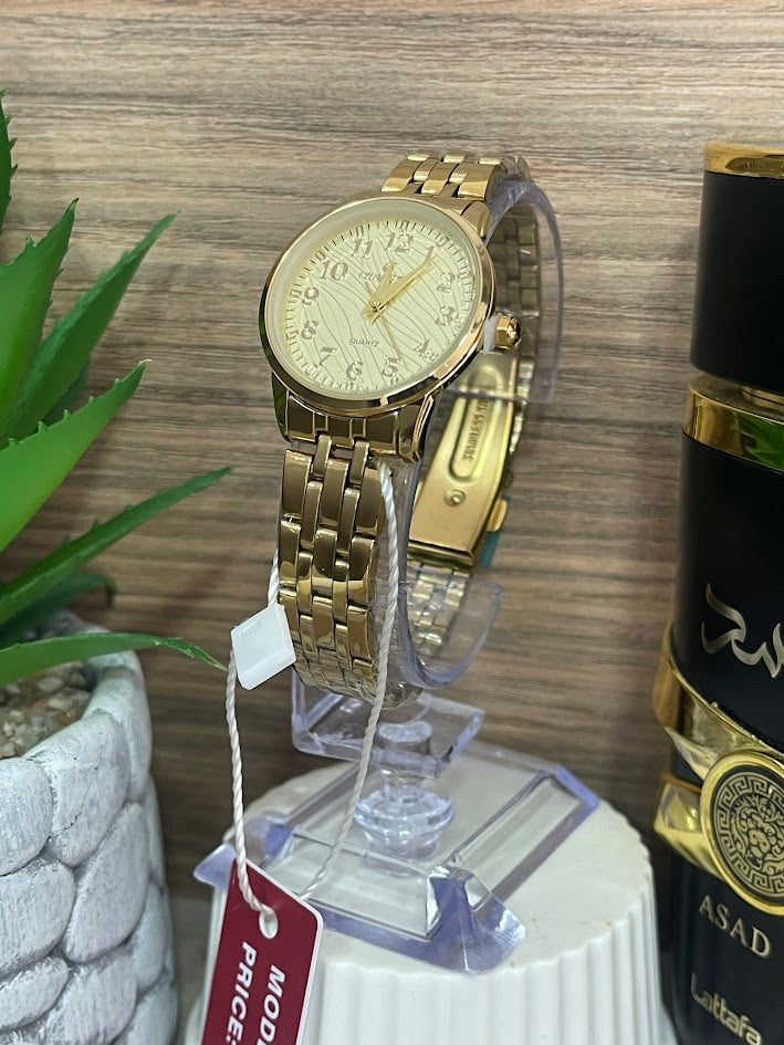 RELOJ CHAXIGO DAMA DORADO ESFERA CON LINDO DESEÑO