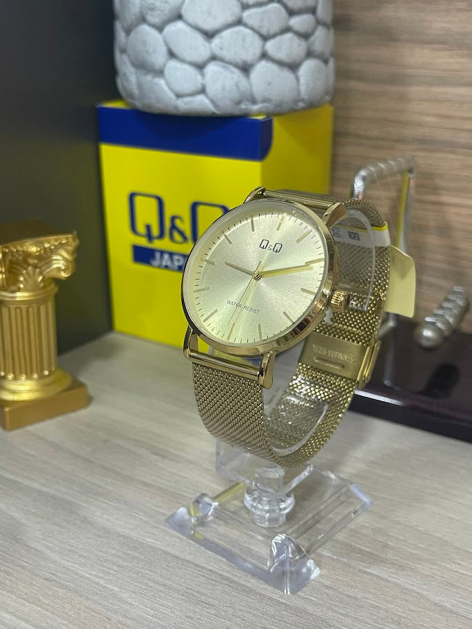 RELOJ QYQ ORIGINAL CABALLERO DORADO MANILLA TEJIDA
