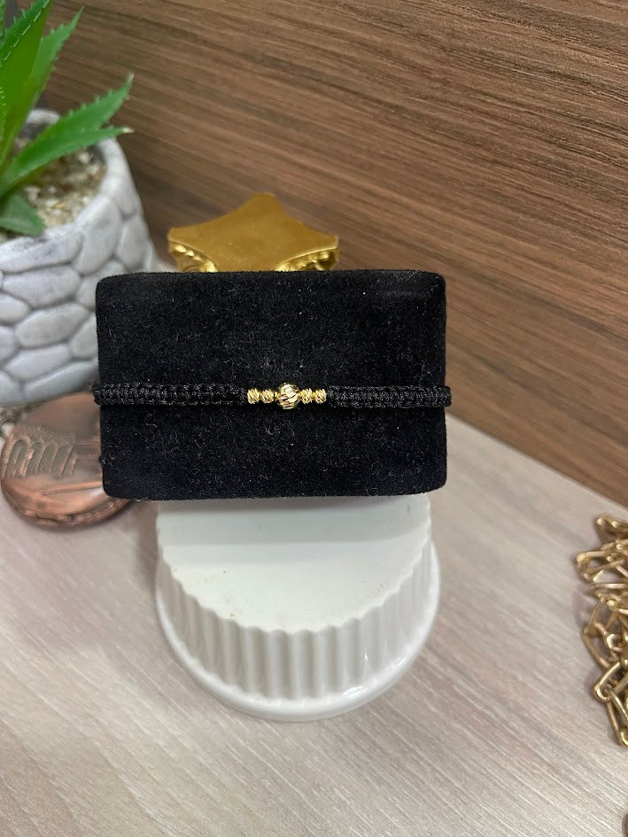 PULSERA NEGRA BALINES DIAM 4Y6 ORO LAMINADO