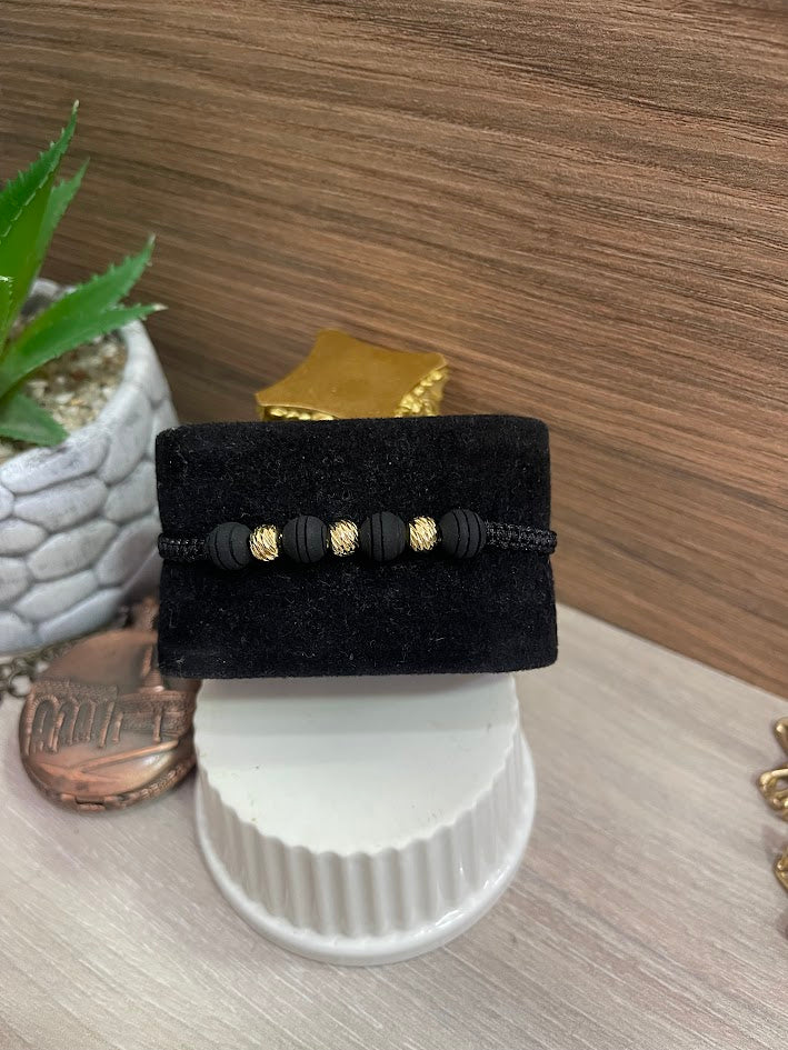 PULSERA TEJIDA NEOPRENO BALIN 6MM NEGRO ORO LAMINADO