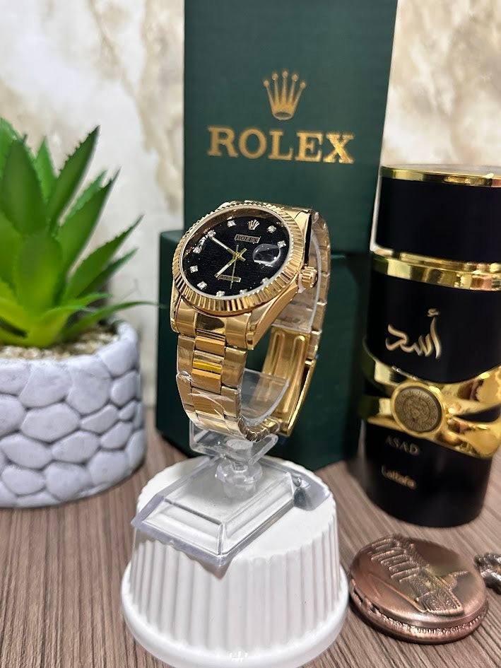 Rolex Dama Dorado Esfera Negra Aro en Relieve