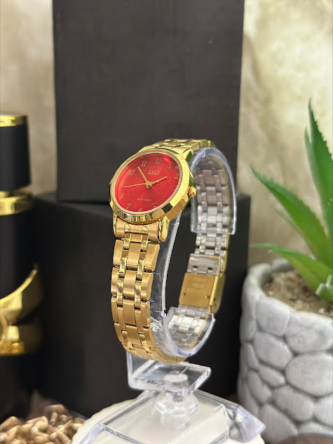 QYQ DAMA DORADO ESFERA ROJA