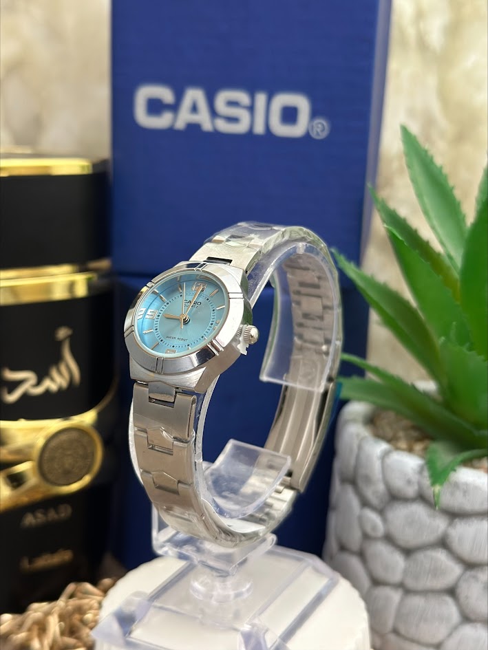CASIO DAMA PLATEADO ESFERA AZUL