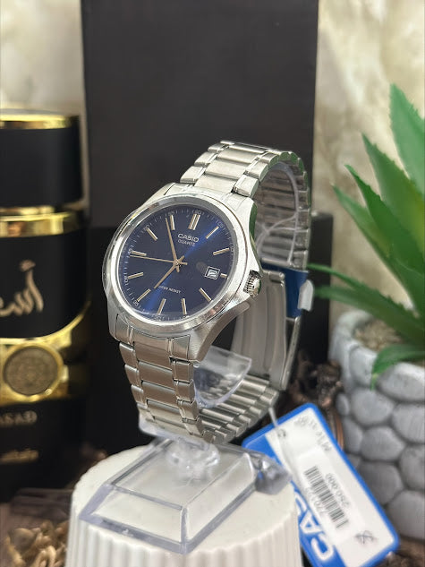 CASIO CABALLERO PLATEADO FONDO AZUL