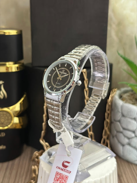 CAXIGO DAMA REDONDO PLATEADO FONDO NEGRO