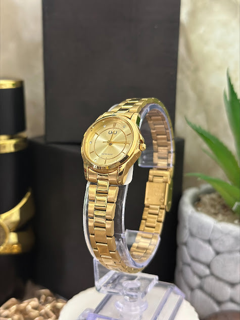 QYQ DAMA REDONDO TODO DORADO CON NUMEROS DIAMANTES