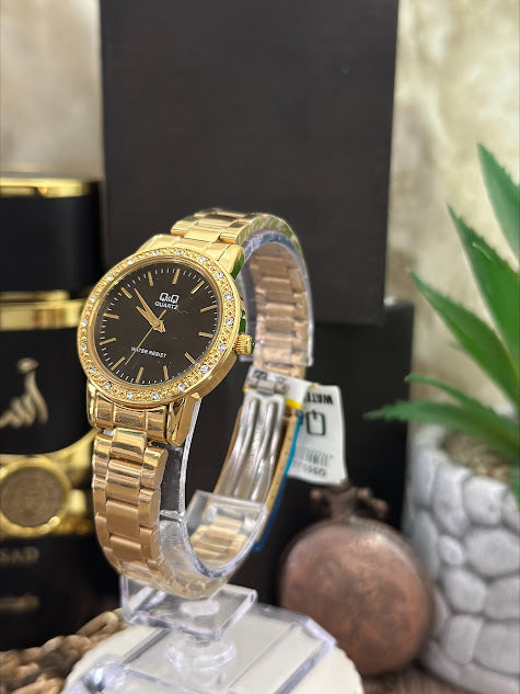 QYQ DAMA DORADO REDONDO ESFERA NEGRA BORDE DIAMANTADO