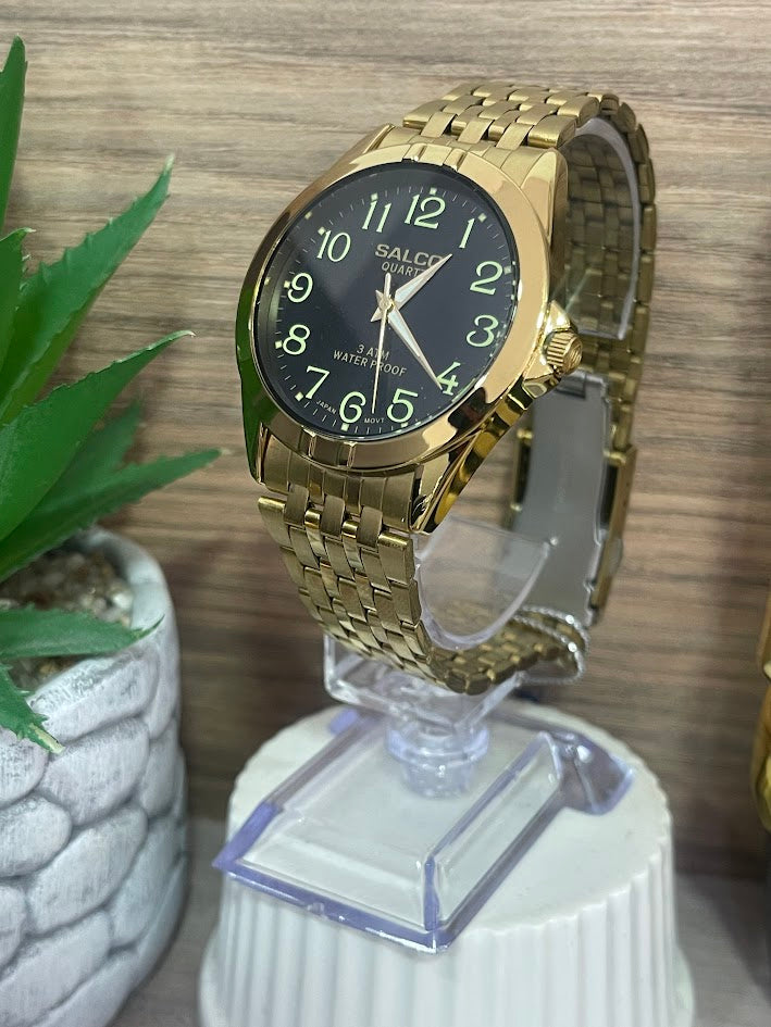 RELOJ SALCO DORADO NUMEROS FLUORECENTES