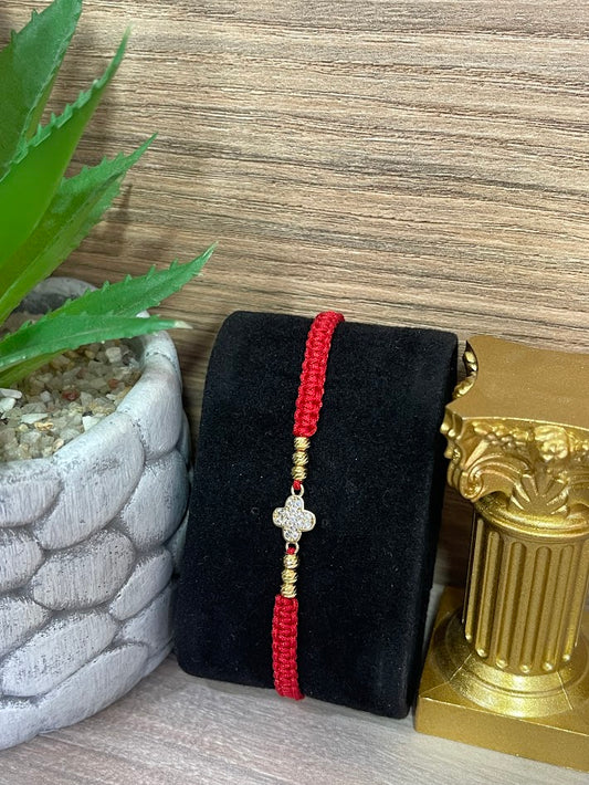PULSO ORO LAMINADO MINI TREBOL ROJO