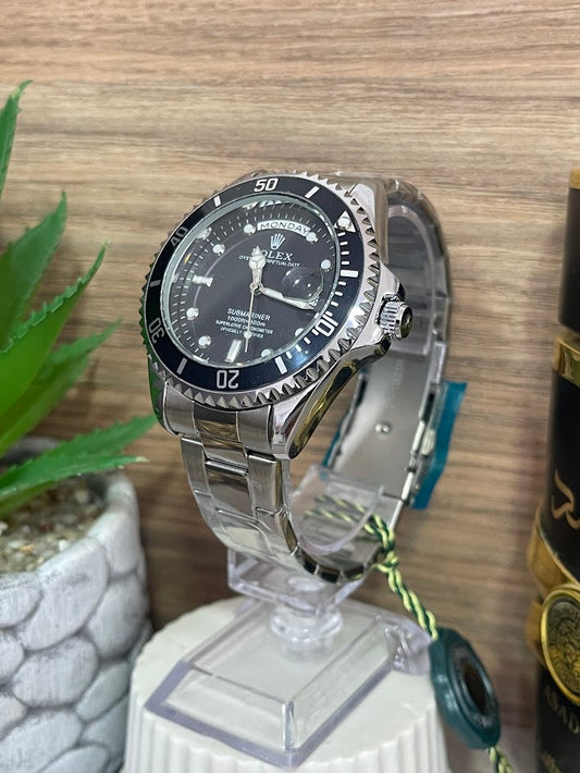 RELOJ ROLEX CABALLERO PLATEADO ESFERA Y ARO NEGRO