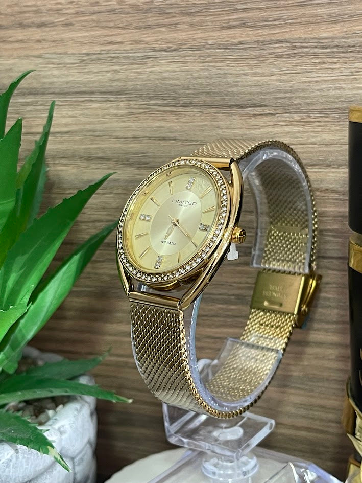 RELOJ LIMITED DAMA DORADO OVALADO DETALLES EN PIEDRAS