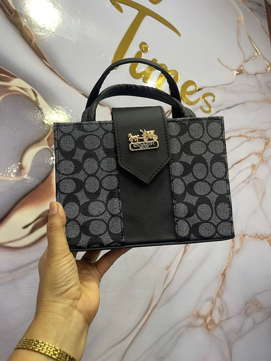 BOLSO COACH COMBINADO GRIS Y NEGRO
